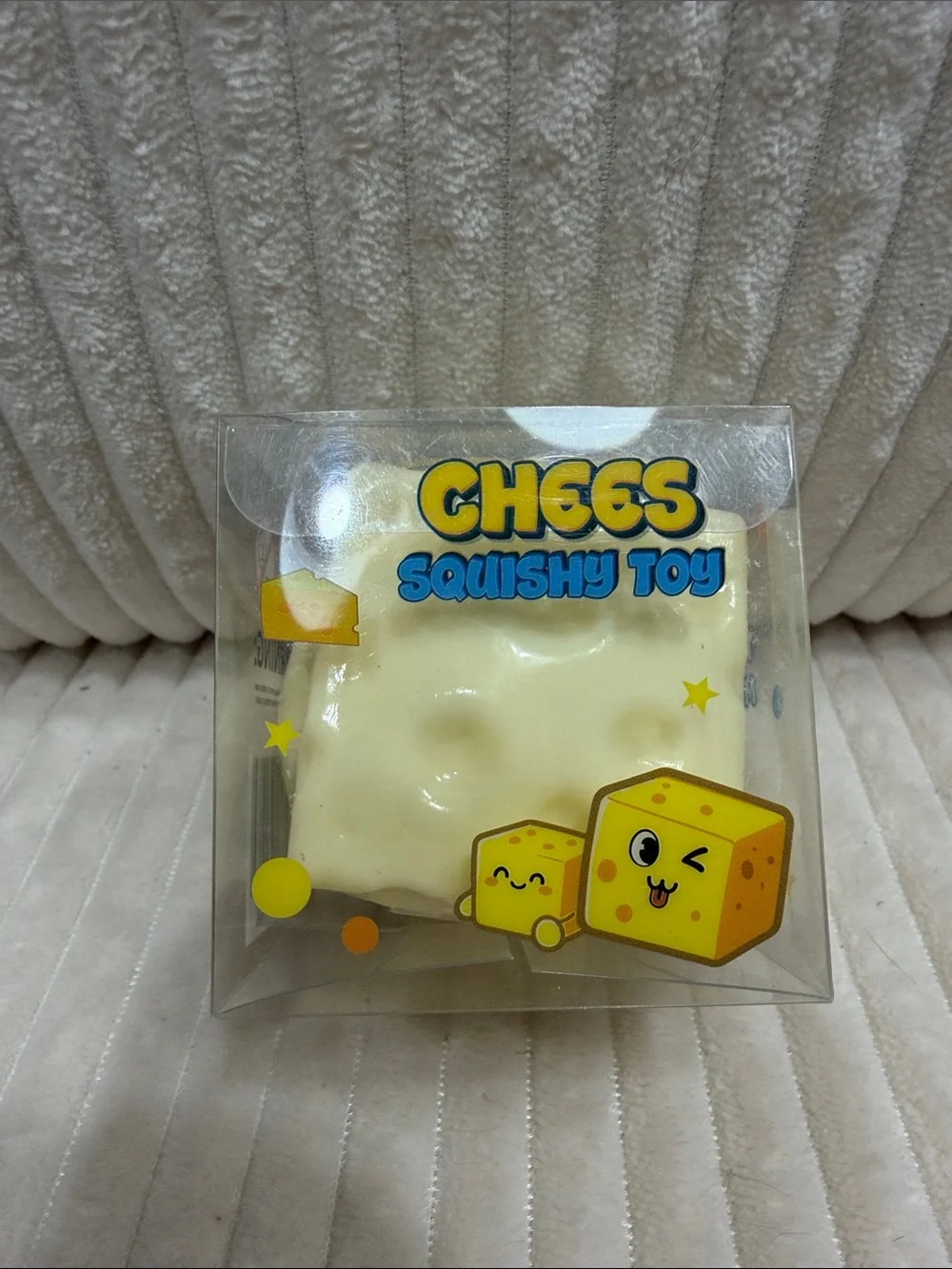 Chees Small Squishy Toy - New in package. 2”x2” size.